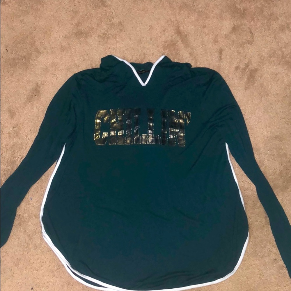 Long sleeve tee with a hood.